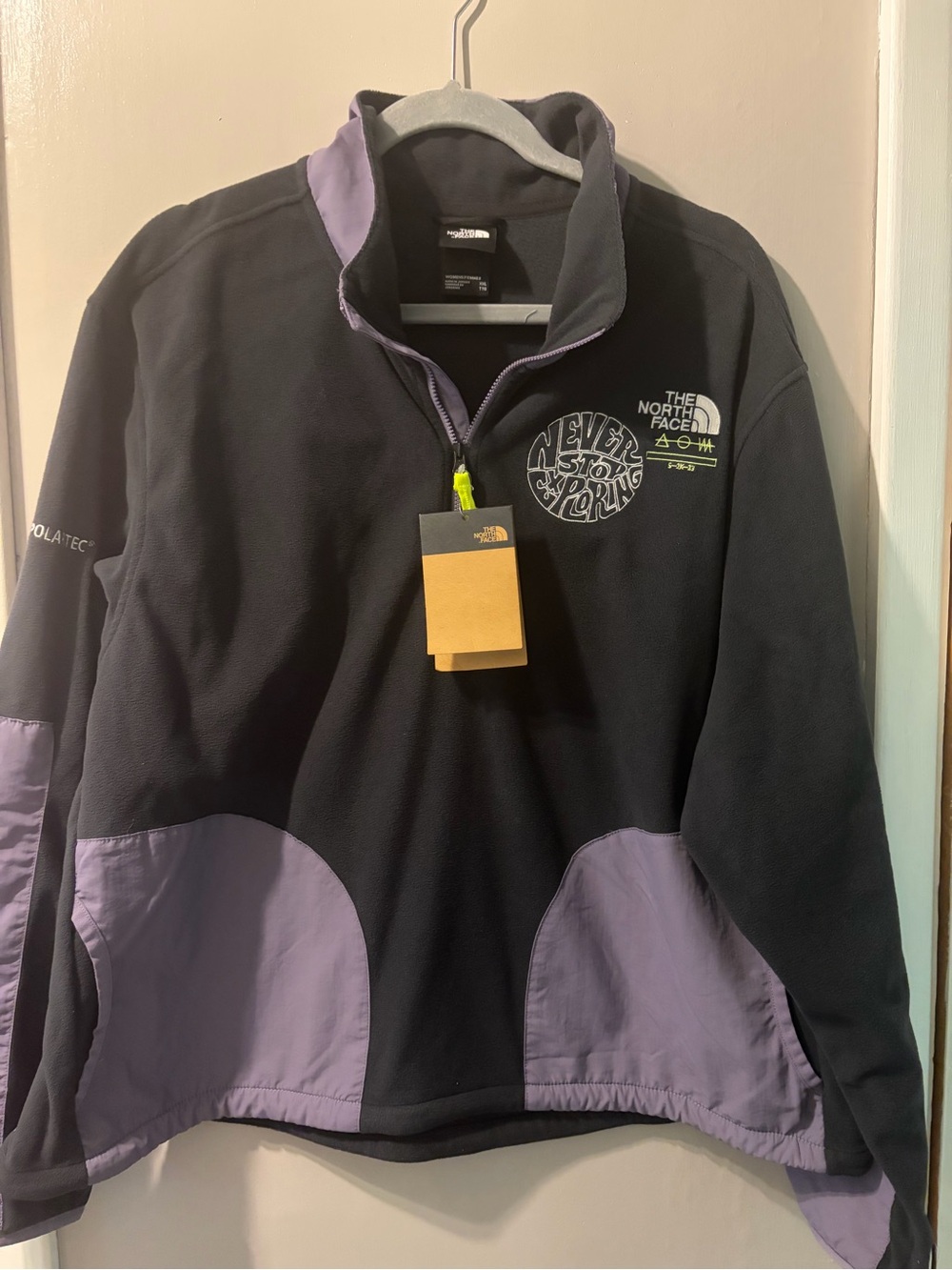 The North Face Woman’s Black and Lavender Zip-Up Fleece